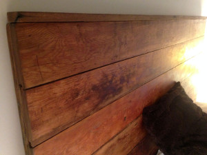 custom-made reclaimed wood headboard